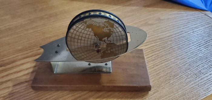 I Bought This "Thing" Years Ago, But Never Knew What It Was, I Just Thought It Looked Cool! The Center Globe Piece Spins And Is Weighted At One End, So Even If You Give It A Spin, It Always Ends Up With The "10" Facing Up. The Numbers Are 10-130, In Increments Of 10. What Is This Thing?