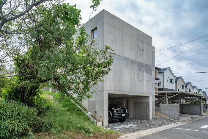 Japanese Architects Build Exposed Concrete House With A Delicate And Warm Interior