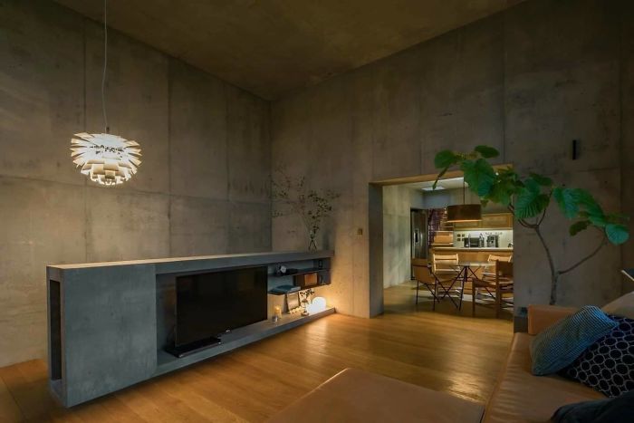 Japanese Architects Build Exposed Concrete House With A Delicate And Warm Interior