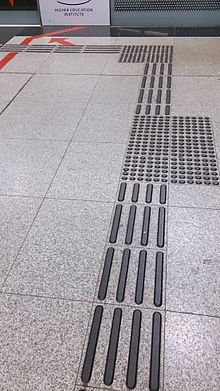 220px-Tactile_paving_in_a_Mass_Rapid_Transit_station_in_Singapore_-_20131105.jpg