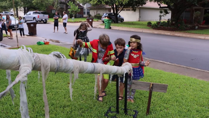 Parents Come Up With A "Candy Slide" For Safe Trick-Or-Treating This Halloween