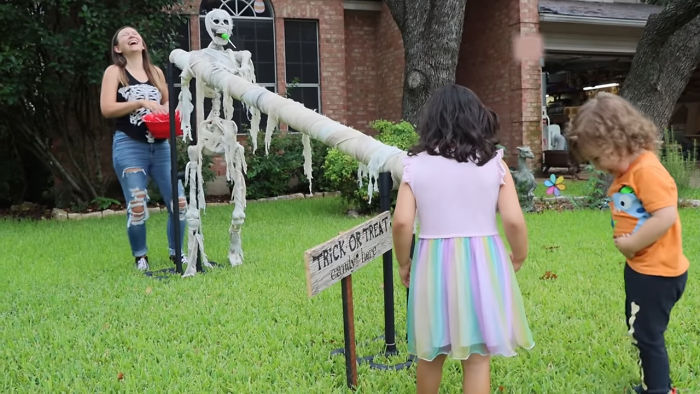 Parents Come Up With A "Candy Slide" For Safe Trick-Or-Treating This Halloween