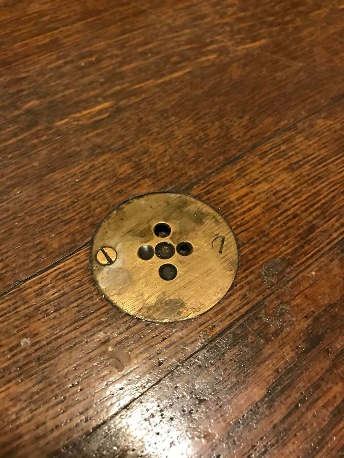 Right In The Center Of My Bedroom’s Floor, Which Is A Converted Dining Room In A 1920s Apartment. Also Directly Below The Light Fixture. What Is This Thing?