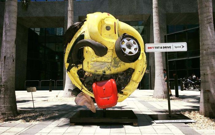 Local Artist, Rudolf Kohn, Transformed A Mangled Car Into An Emoji As An Anti Texting & Driving Psa In Miami