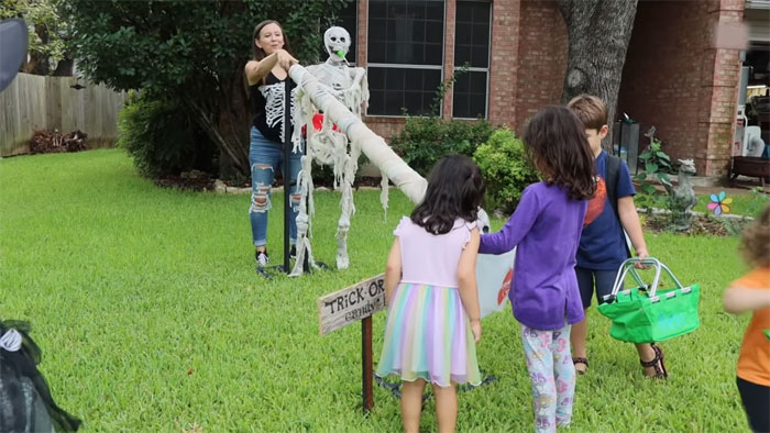Parents Come Up With A “Candy Slide” For Safe Trick-Or-Treating This Halloween