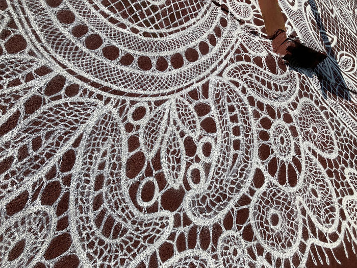 Warsaw-Based Artist Spray-Paints A Beautiful Lace Mural On The Side Of A French Lace Museum