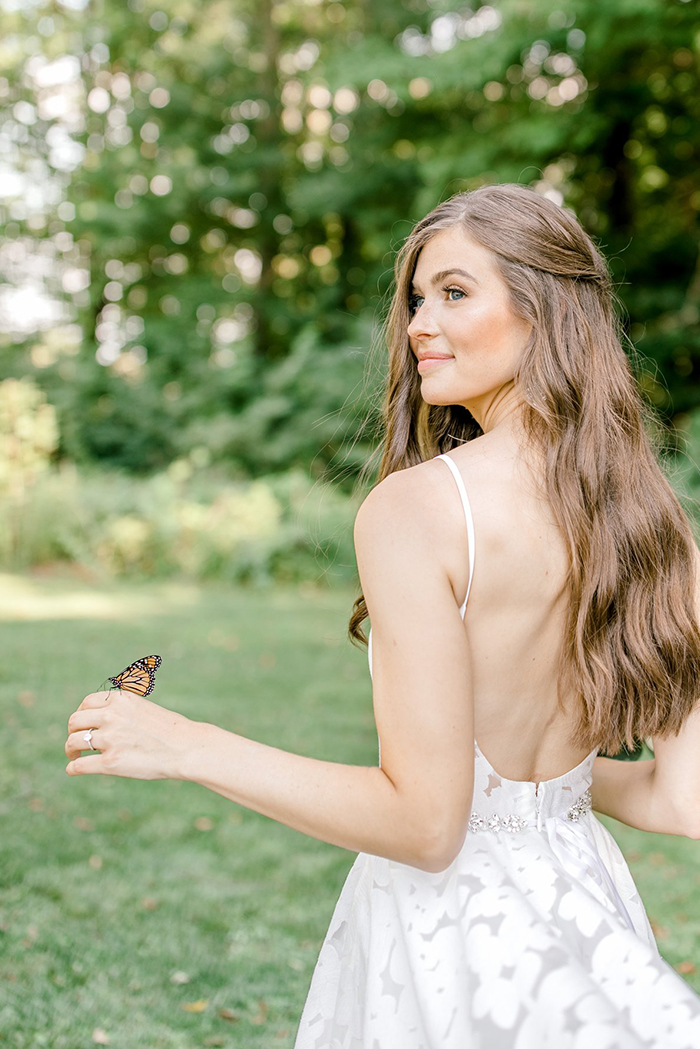 Couple's Wedding Photoshoot Gets A Fairytale-Like Twist After A Monarch Butterfly Joins In