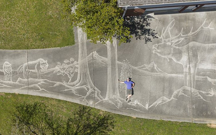 Photographer Uses A Pressure Washer To Create A Beautiful Mural On His Driveway