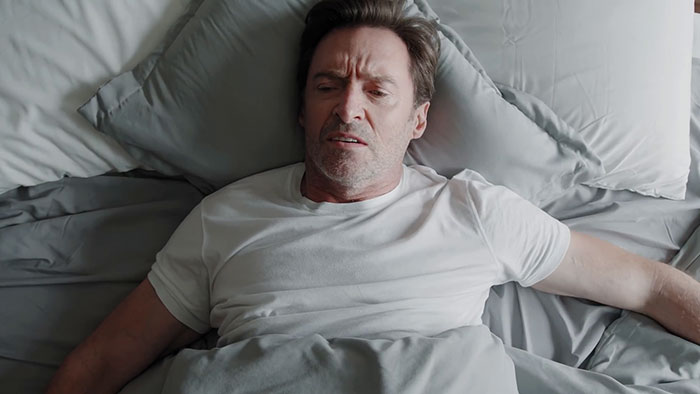 New Hugh Jackman Coffee Ad Goes Viral Because It’s Hilariously Narrated By His ‘Frenemy’ Ryan Reynolds