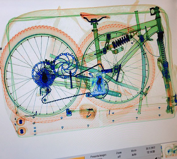 A Bike Going Through The Security X-Ray At The Malaga Airport