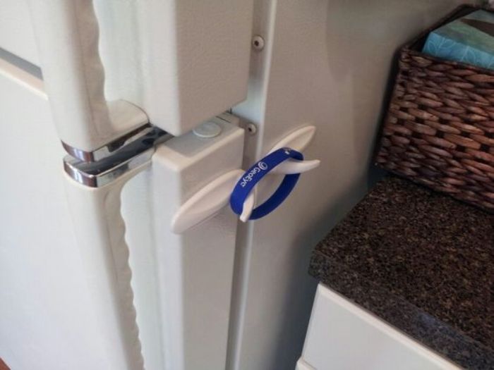 Use Command Clips & A Bracelet To Child Proof Your Fridge
