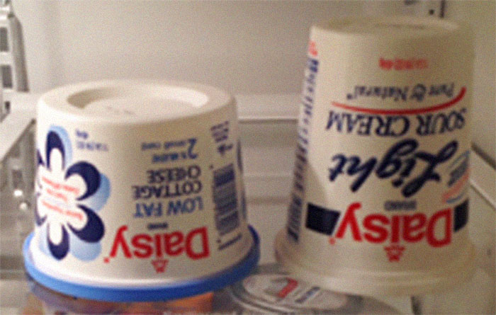 Turning Containers For Sour Cream And Cottage Cheese Upside Down