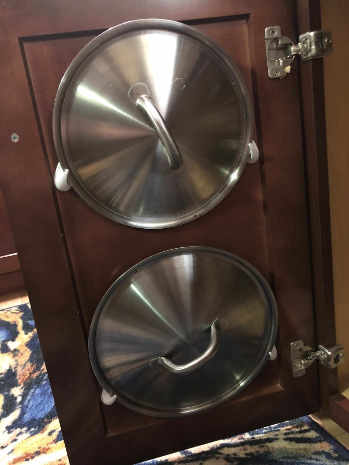 I Used Command Hooks To Hang My Pan Lids Onto The Inside Of A Cabinet Door