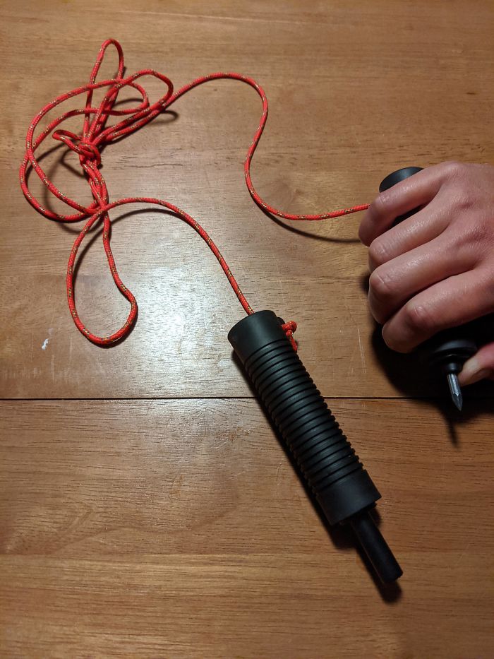 Jump Rope Spike? Two Spring Covered Spikes Connected With Paracord