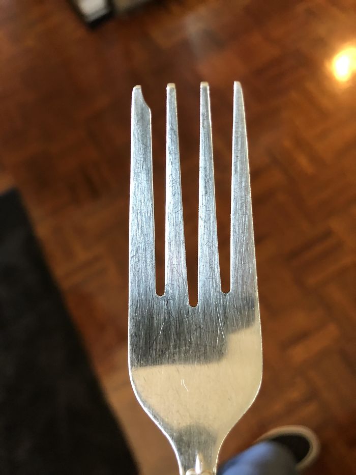 What Is The Purpose Of The “Chip” In The One Prong Of This Fork? At First, I Though It Actually Was Just A Chip, But Turns Out Its On Multiple Forks In My Drawer. Any Ideas?