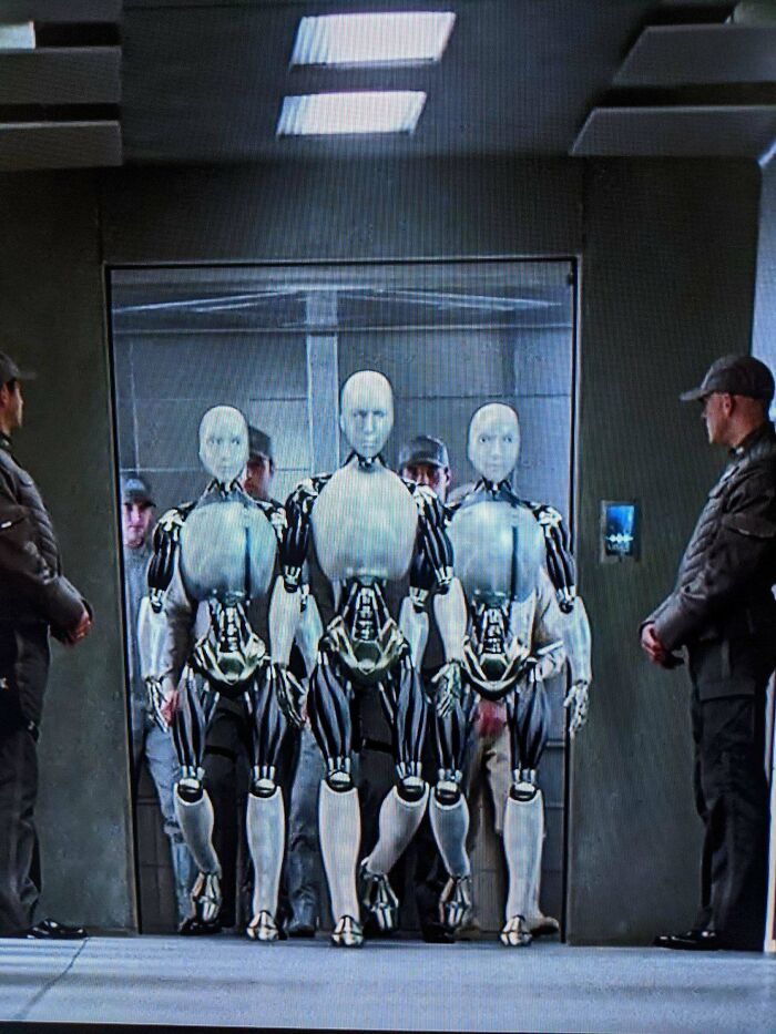 In "I, Robot" (2004), Sonny Is Not In Lock-Step With The Other Robots As He's Being Escorted, Which Subtly Sets Him Apart As Unique Even During The Most Mundane Actions