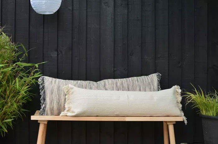 Turn Taulov Or Sortsö Rugs Into Fringed Bench Pillows.