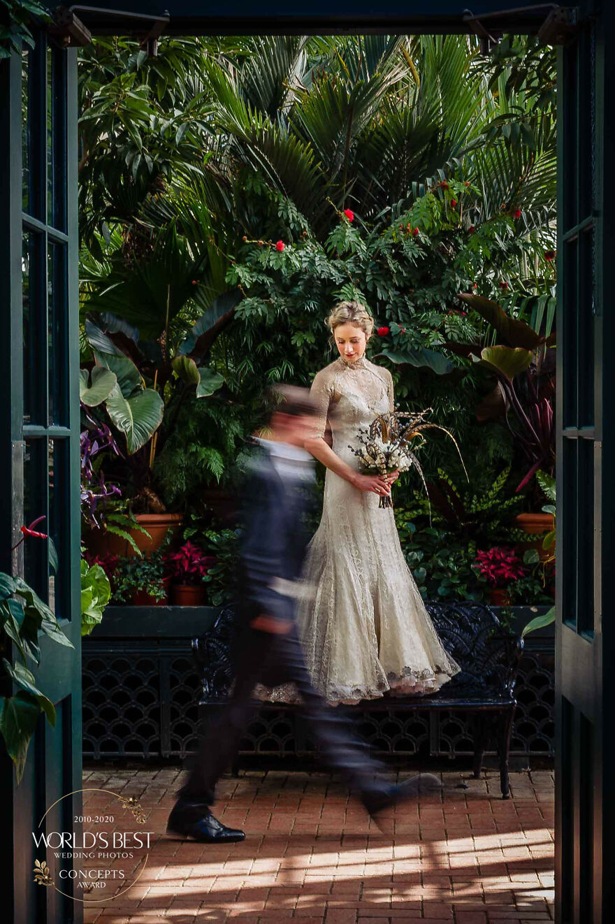 This Unique Portrait Of A Bride With Her Groom Passing By, Photo By Viridian Images