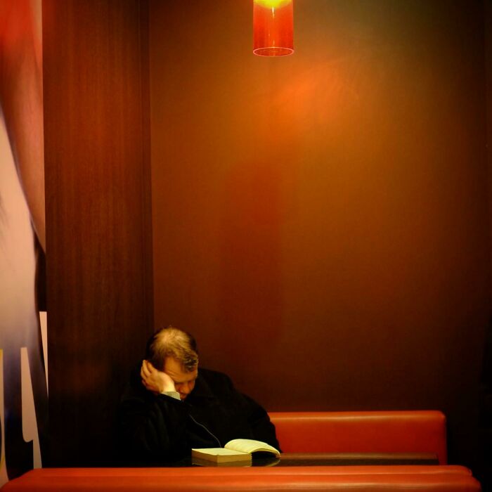 Man Reading At Mcdonalds