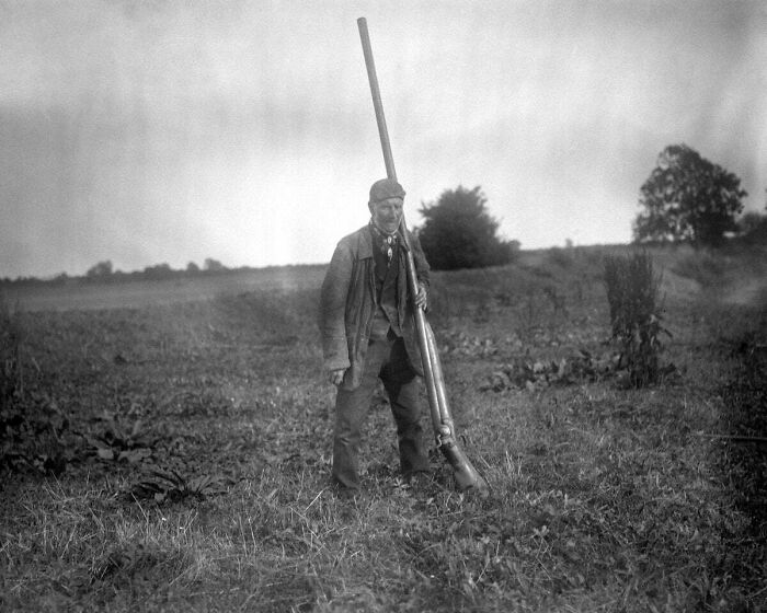 A Man With A Punt Gun, A Type Of Large Shotgun Used For Duck Hunting. It Could Kill Over 50 Birds At Once And Was Banned In The Late 1860s