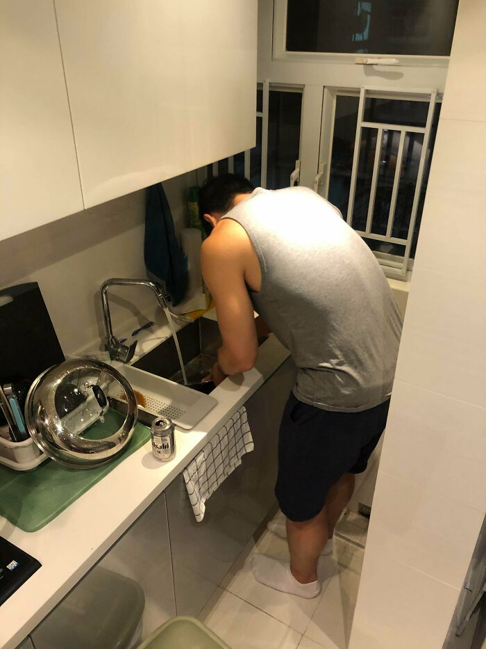 My 6’6 Buddy Doing Dishes At My Apartment.
