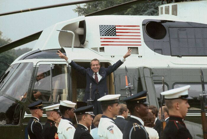 Richard Nixon Waves Goodbye As He Boards A Helicopter After Resigning The Presidency Earlier That Day (Aug. 9, 1974)