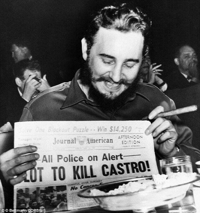 Fidel Castro Laughing At A Newspaper Headline While Visiting New York In 1959