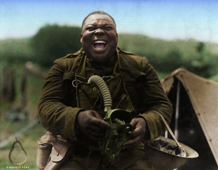 'big Nims' Of The United States 3rd Battalion, 366th Infantry, Laughing At The Sight Of His Comrades With Gas Masks On, 1918