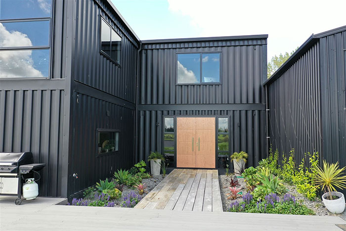 This House Was Built Out Of 12 Shipping Containers And Both The Interior And Exterior Look Stunning