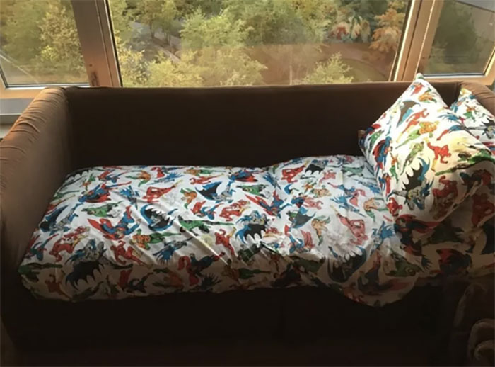 These Parents Who Made Their Couch Feel ~homey~ For Their Son Who Just Moved Back In.