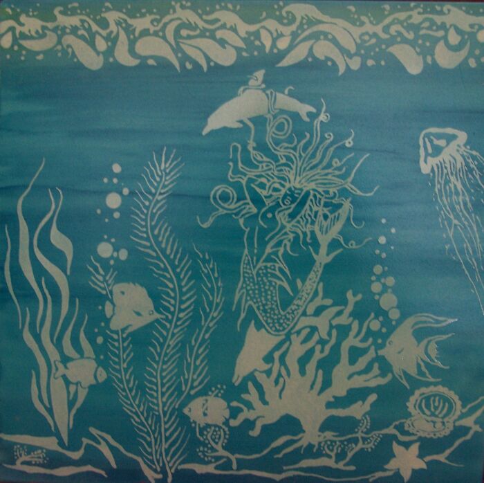 Underwater Scene With Mermaid Etched Into Tile.
