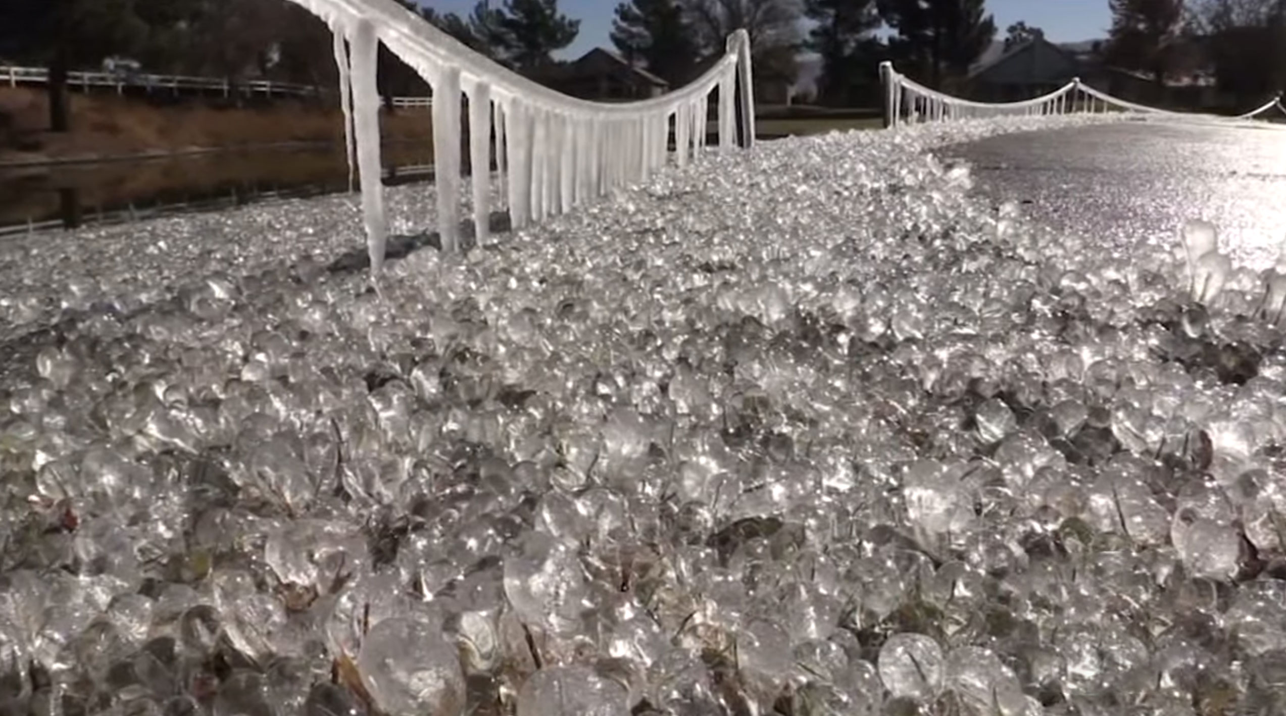 Sprinkler Creates A Frozen Wonderland On This Golf Course After Temperatures Suddenly Drop