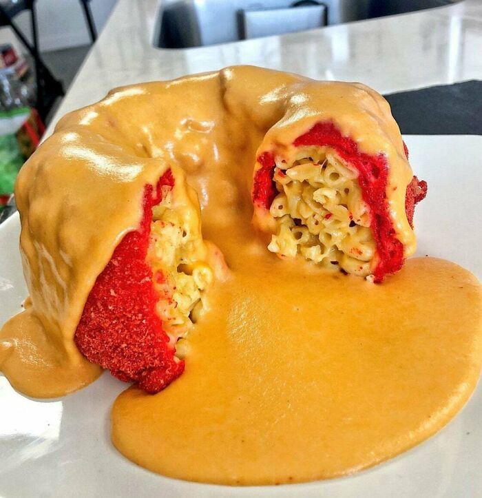 Mac And Cheese Stuffed Hot Cheeto Smothered In Queso