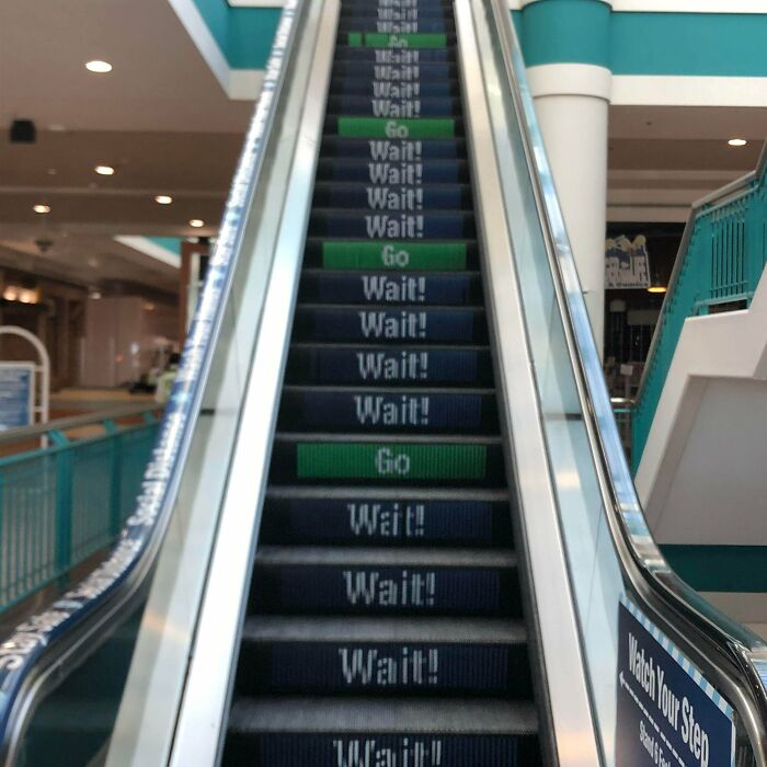 Social Distancing Escalator At Local Mall.