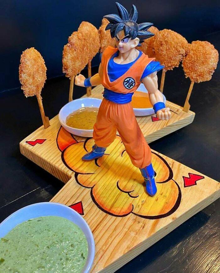 Fried Shrimp Served On A Wooden Lightning Bolt With An Attached Goku Figurine