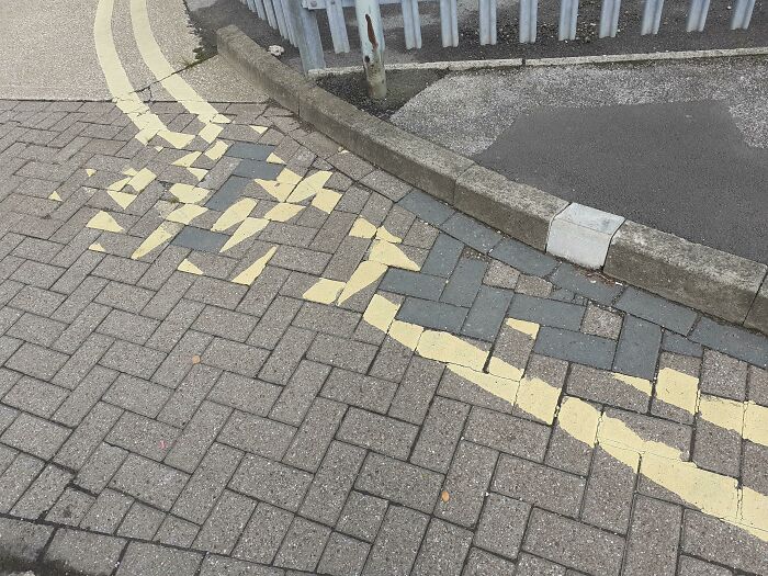 The Way The Bricks Have Not Been Replaced Properly (To Make The Double Yellow Lines)
