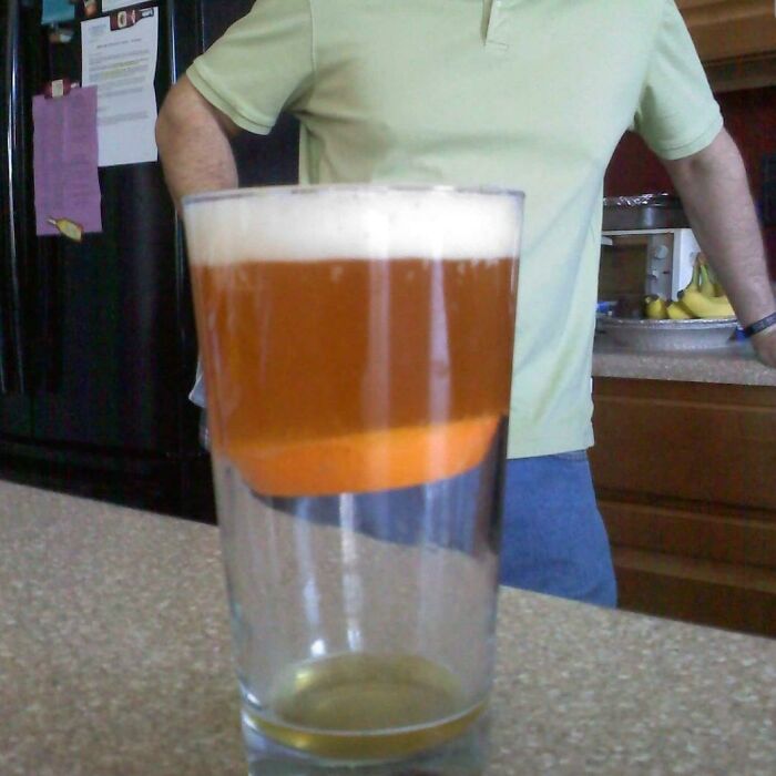 Hubby Tossed In An Orange Slice Before Pouring The Beer And Didn't Notice The Fit Until The Beer Wouldn't Fit Into The Glass. It Sat Like That For A While Without Leaking To The Bottom, So We Eventually Broke The Seal So We Could Get On With More Important Things, Like Drinking The Beer