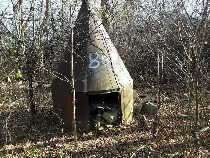 I Found This Strange Thing Behind An Abandoned House In Mid-Michigan. It's A Weird Cone-Shaped Metal Structure With An Open Inside.