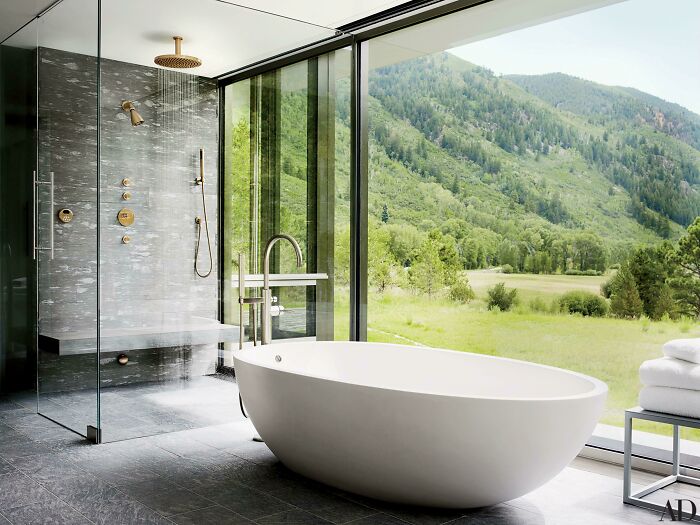 A Large Shower And Bathtub With Mountain Views In Aspen, Co