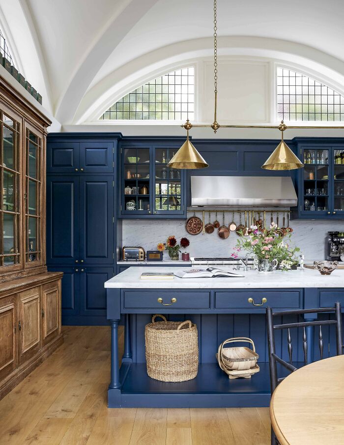 Blue Cabinetry Kitchen With A Vaulted Ceiling And Arched Clerestory Windows In An 1910s Arts And Crafts Styled House, North London, UK