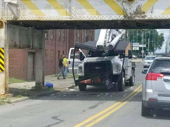 Y Bridge Overpass In Zanesville, Oh Claims It's Newest Victim. A Tree Service Bucket Truck