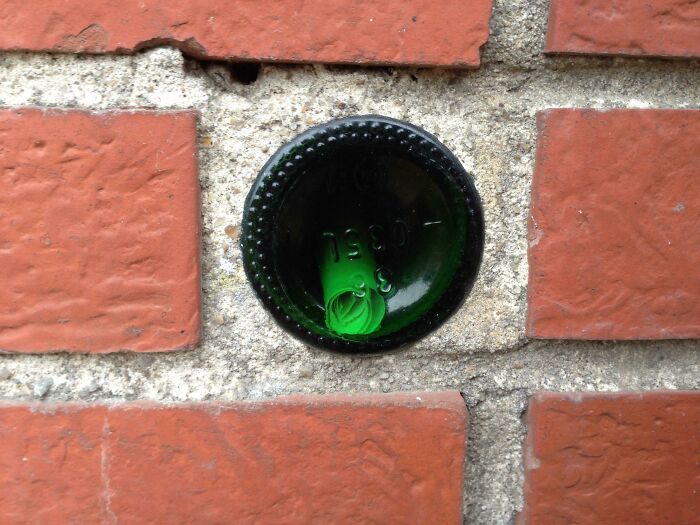 I Found A Wall With A Bottle Build Into It Which Has A Small Note Inside