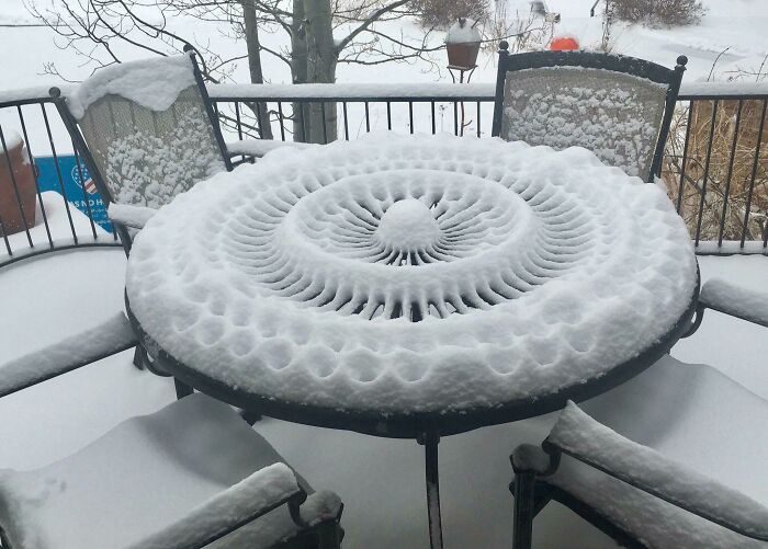 This Pattern In The Snow On A Patio Table