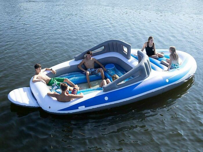 A Full-Sized Inflatable Boat, Complete With Beer Cooler.