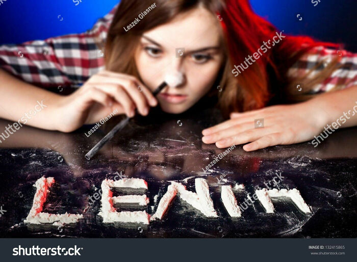 Teenager Snorting Cocaine, That Has Been Positioned To Spell Out Lenin