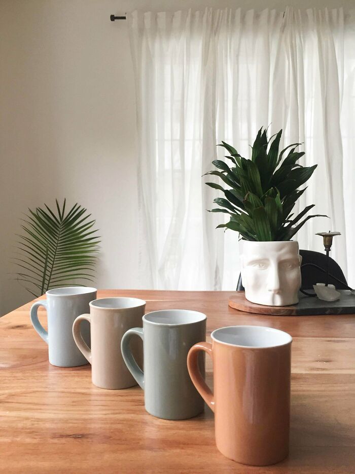 Mugs In Soft Muted Colours For $0.25 A Piece