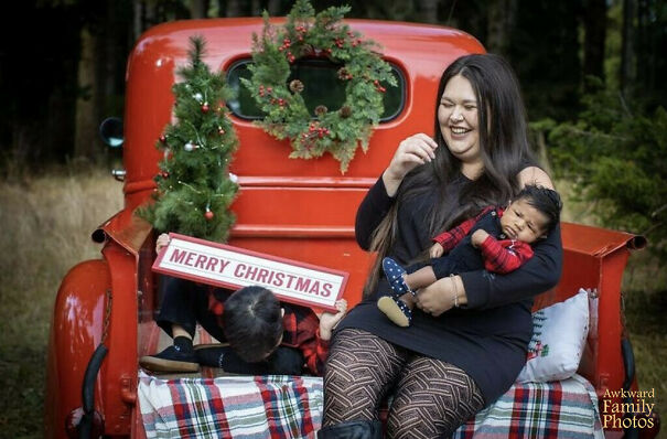 I Tried To Get Some Christmas Card Photos With My Boys This Year. My 5 Year Old Was Not Having It And Refused To Cooperate (Look Under The Sign). But This One Took The Cake For Me Since The Baby Is Puking As Well