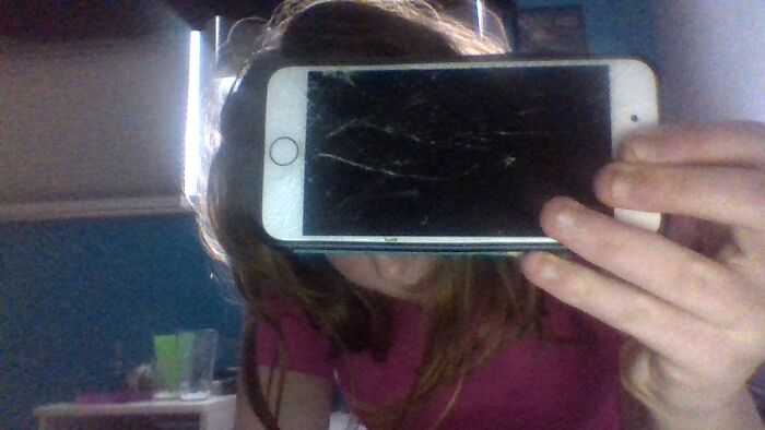 My Broken Phone. Brought To You By A 5 Foot Fall Off Of A Swing Set Onto A Wooden Board