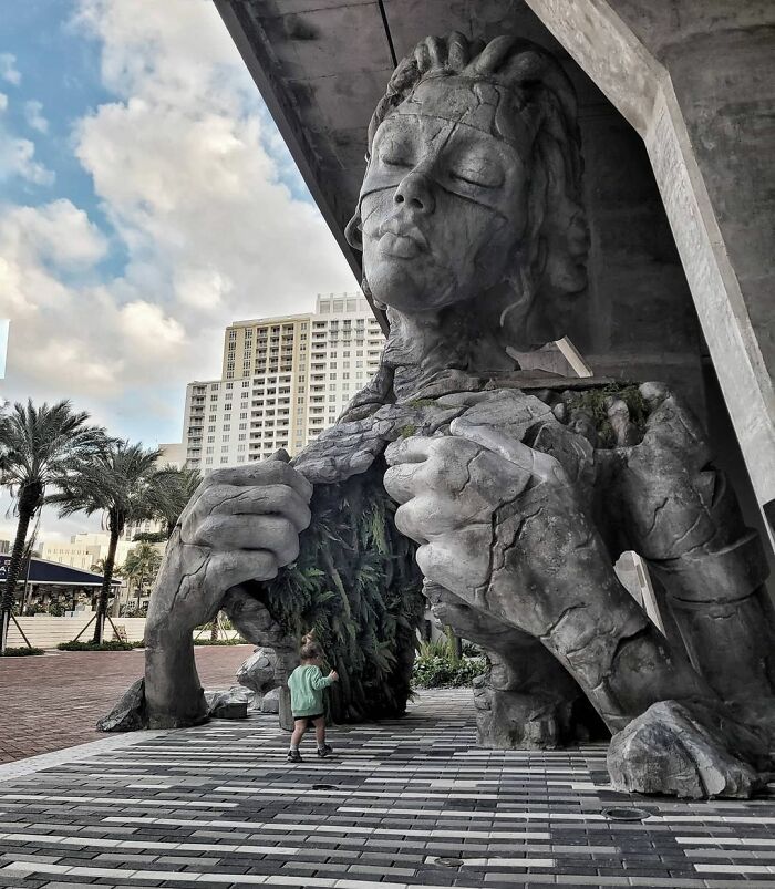 Giant Sculpture Of A Woman Opening Her Chest To Reveal A Fern-Covered Tunnel Appears In Florida