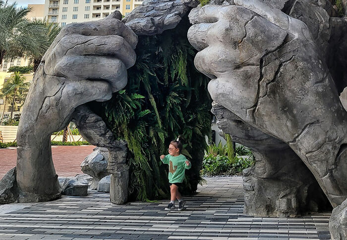 Giant Sculpture Of A Woman Opening Her Chest To Reveal A Fern-Covered Tunnel Appears In Florida